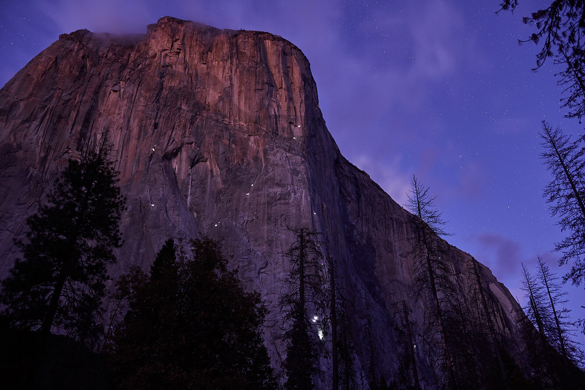 El Capitan at night; an illustrative landscape, not a promised stop on a day tour.